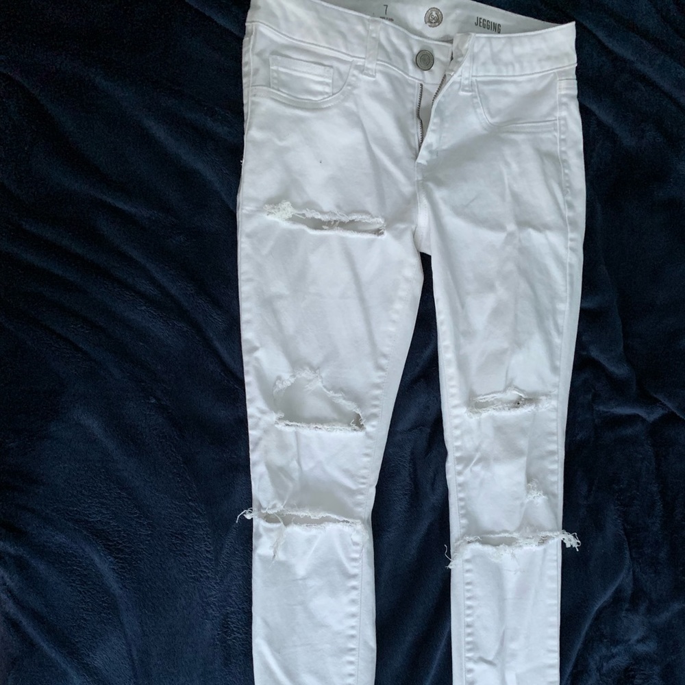 White ripped jeans